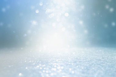 soyut glitter gümüş, altın, mavi ışıklar arka plan. de-odaklı