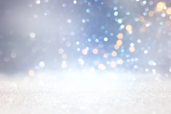 Abstract glitter silver, gold , blue lights background. de-focused — Stock Photo, Image