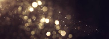 soyut glitter ışıkları arka plan. altın ve siyah. de odaklanmış. Afiş