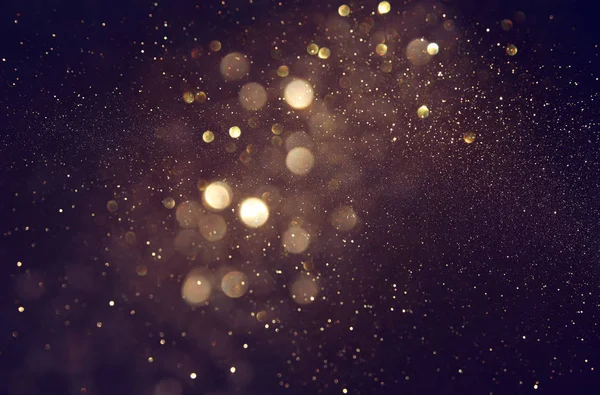 Soyut glitter ışıkları arka plan. altın ve siyah. de odaklı — Stok fotoğraf