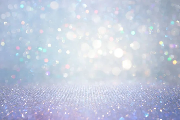 Soyut glitter gümüş, altın, mavi ışıklar arka plan. de-odaklı — Stok fotoğraf