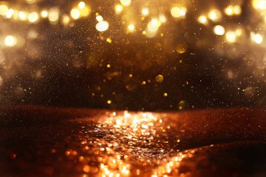 soyut glitter ışıkları arka plan. altın ve siyah. de odaklı