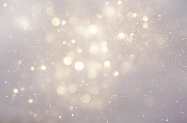 Abstract backgrounf of glitter vintage lights . silver and white. de-focused — Stock Photo, Image