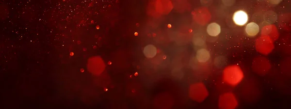 Fundal de lumini abstracte roșu, aur și sclipici negre. defocalizat. banner — Fotografie, imagine de stoc
