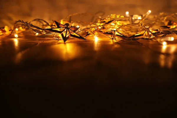 Immagine di sfondo astratto sfocato ghirlanda d'oro luci. sfocato — Foto Stock