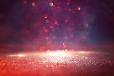 Soyut parıltılı ışıkların arkaplanı. Altın ve mor. & Odaklan