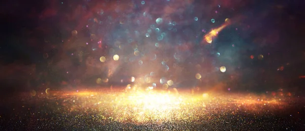 Bakgrund Abstrakta Glitter Ljus Guld Blått Och Svart Fokuserade — Stockfoto