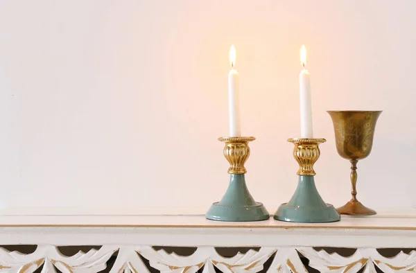 Two Shabbat Candlesticks Burning Candles Wooden Table — Stock Photo, Image