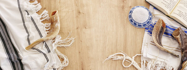 religion image of Prayer book and Shofar (horn) jewish religious symbols. Rosh hashanah (jewish New Year holiday), Shabbat and Yom kippur concept