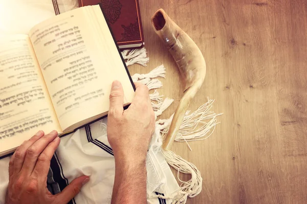 religion image of Prayer book and Shofar (horn) jewish religious symbols. Rosh hashanah (jewish New Year holiday), Shabbat and Yom kippur concept