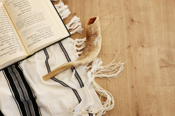 religion image of Prayer book and Shofar (horn) jewish religious symbols. Rosh hashanah (jewish New Year holiday), Shabbat and Yom kippur concept