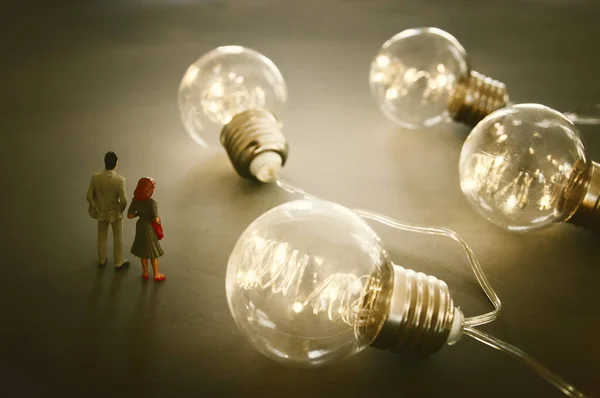 Surreal Image People Looking Glowing Light Bulbs Concept Finding Right — Stock Photo, Image