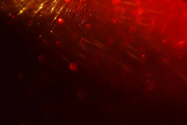 Fondo Luces Abstractas Brillo Rojo Oro Negro Desenfocado —  Fotos de Stock