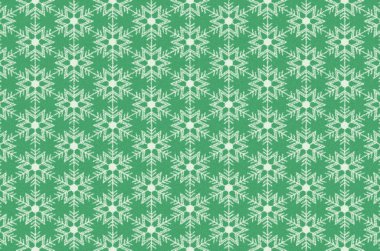 Yeşil arkaplanda kar taneleri