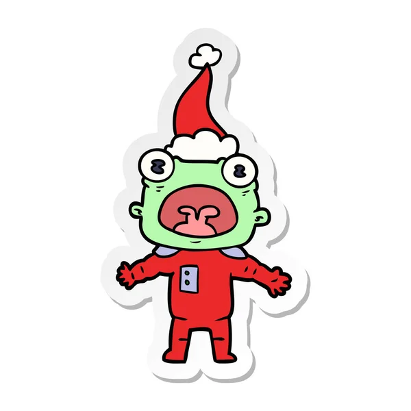 Hand Drawn Sticker Cartoon Weird Alien Communicating Wearing Santa Hat — Stock Vector