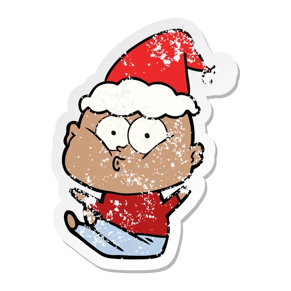 Distressed sticker cartoon of a bald man staring wearing santa h — Stock Vector