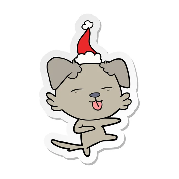 Sticker cartoon of a dog dancing wearing santa hat — Stock Vector