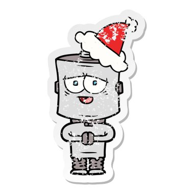 sıkıntılı etiket karikatür Noel Baba şapkası giyen bir robot el çekilmiş