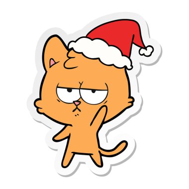 etiket karikatür Noel Baba şapkası giyen bir kedi sıkılmış el çekilmiş