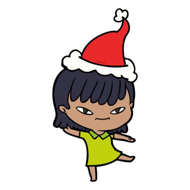 Noel Baba şapkası giyen bir kadın çizgi çizme