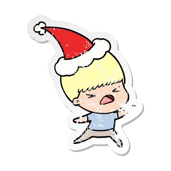 Distressed sticker cartoon of a stressed man wearing santa hat — Stock Vector