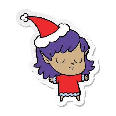 etiket karikatür Noel Baba şapkası giyen bir elf kızın el çekilmiş