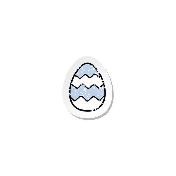 Verontruste sticker van een cartoon geschilderde easter egg — Stockvector