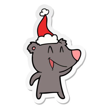 ayı etiket karikatür giyen Noel Baba şapkası, gülüyor