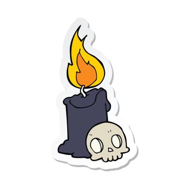 etiket bir karikatür kafatası ve mum