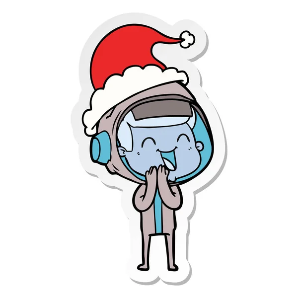 Glückliche Handgezeichnete Sticker Karikatur Eines Astronauten Mit Weihnachtsmütze — Stockvektor