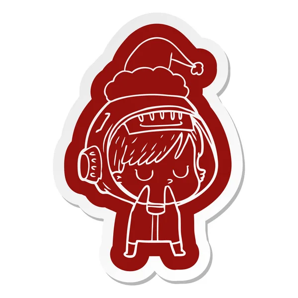 Adesivi cartoni animati di una donna astronauta indossa cappello di Babbo Natale — Vettoriale Stock