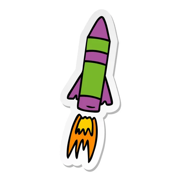 Pegatina de dibujos animados garabato de un cohete espacial — Vector de stock