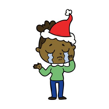 Noel Baba şapkası giyen bir ağlayan kadının çizgi çizme