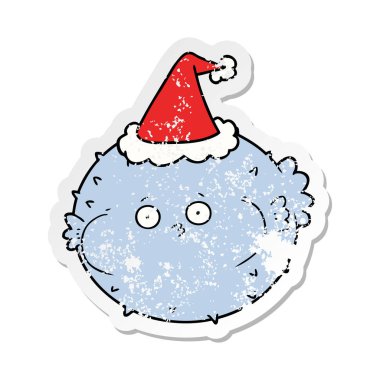 sıkıntılı etiket karikatür Noel Baba şapkası giyen bir kirpi balığı balık