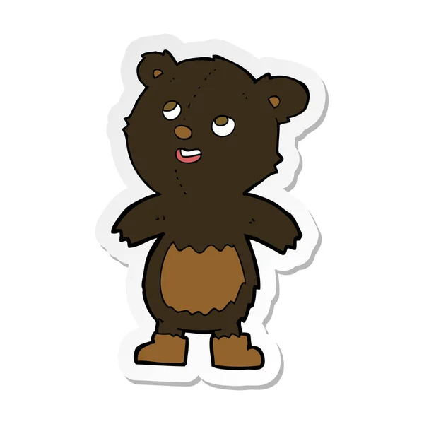 Pegatina de un oso negro de dibujos animados — Vector de stock