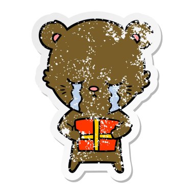 hediye ile ağlayan bir karikatür ayının sıkıntılı etiket