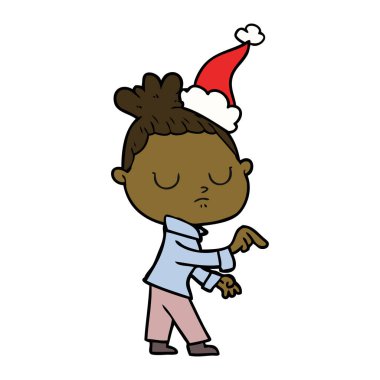 Noel Baba şapkası giyen sakin bir kadının çizgi çizme