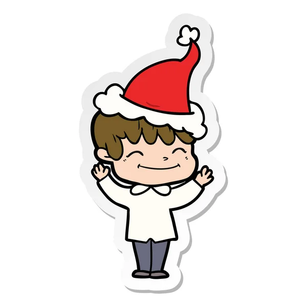 Aufkleber Karikatur eines glücklichen Jungen mit Weihnachtsmütze — Stockvektor