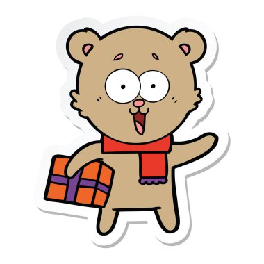 Noel hediyesi ile gülen bir oyuncak ayının etiket