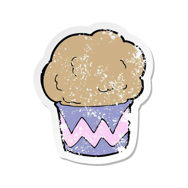 Autocollant de détresse rétro d'un cupcake dessin animé — Image vectorielle