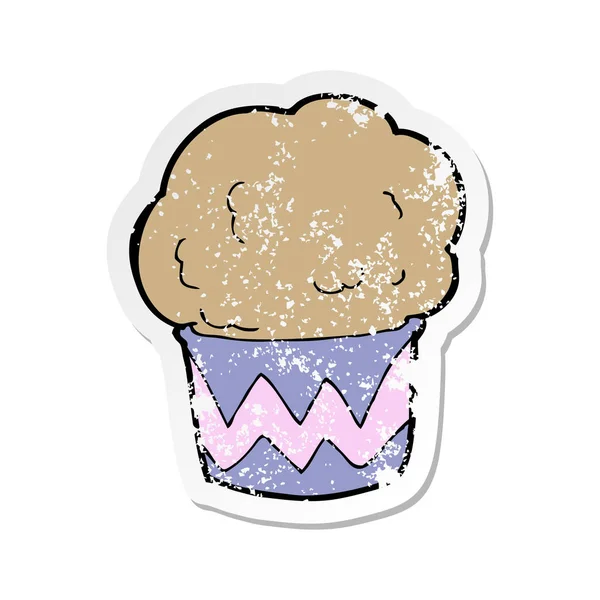 Pegatina retro angustiado de un cupcake de dibujos animados — Archivo Imágenes Vectoriales