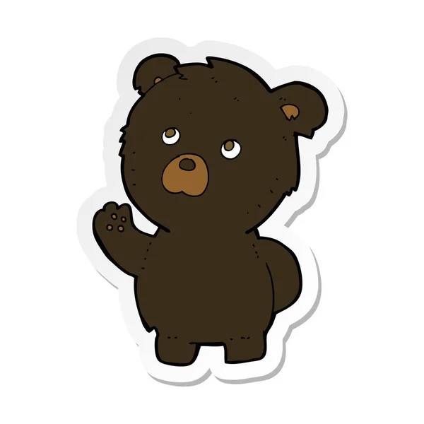 Etiqueta de um urso preto acenando desenhos animados — Vetor de Stock