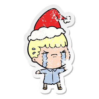 sıkıntılı etiket karikatür giyen Noel Baba şapkası ağlıyor bir adamın el çekilmiş