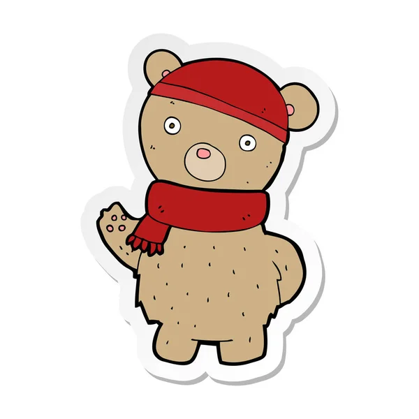 卡通泰迪熊在冬季帽子和围巾贴纸 — 图库矢量图片