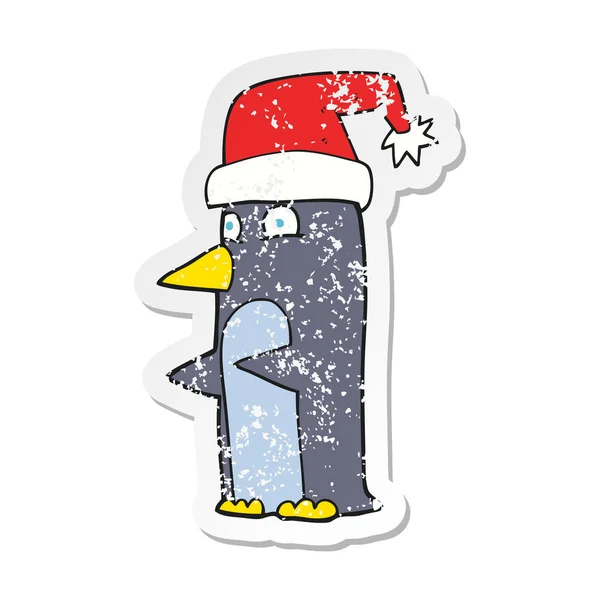 Retro distressed sticker of a cartoon christmas penguin — Stock Vector