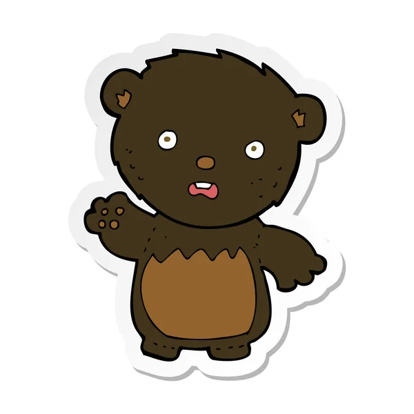 Sticker of a cartoon worried black bear — Stock Vector