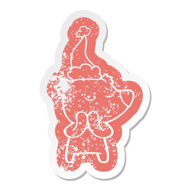 Noel Baba şapkası giyen bir kutup ayısı plakası mutlu ilginç karikatür sıkıntılı