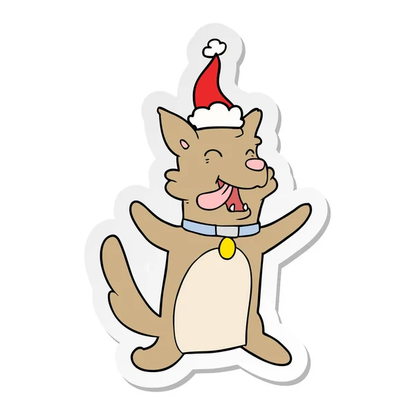 산타 모자를 쓰고 행복 한 강아지의 스티커 만화 — 스톡 벡터