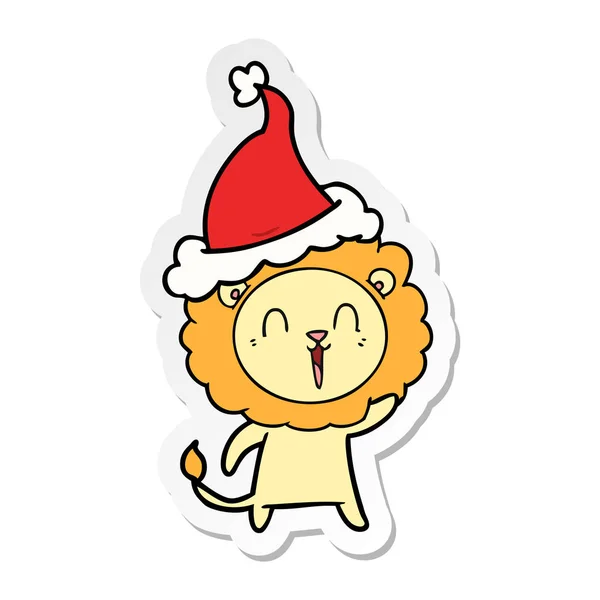 Smějící se nálepka kreslený Lev nošení čepice santa — Stockový vektor