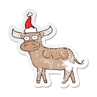 sıkıntılı etiket karikatür Noel Baba şapkası giyen boğa
